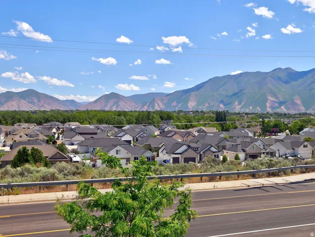 Residential neighborhood with a backdrop of distant mountains