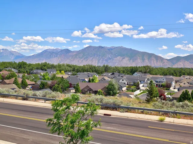 Residential neighborhood with a backdrop of distant mountains