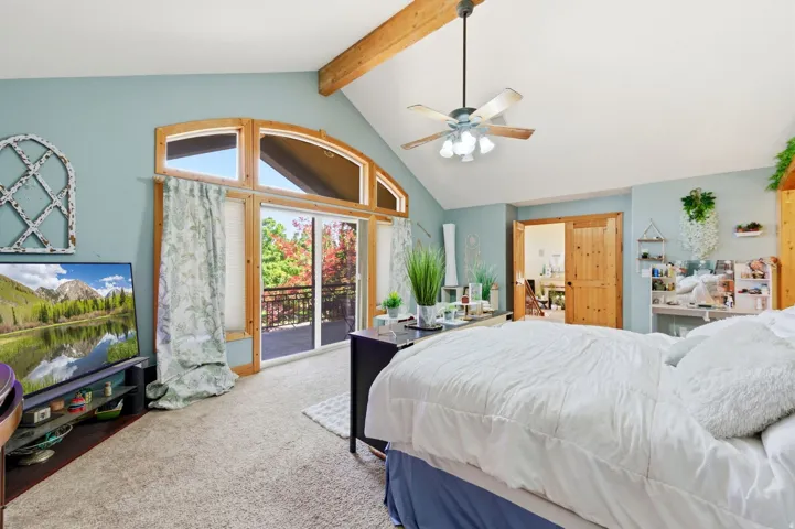 Vaulted ceiling with exposed wood beams