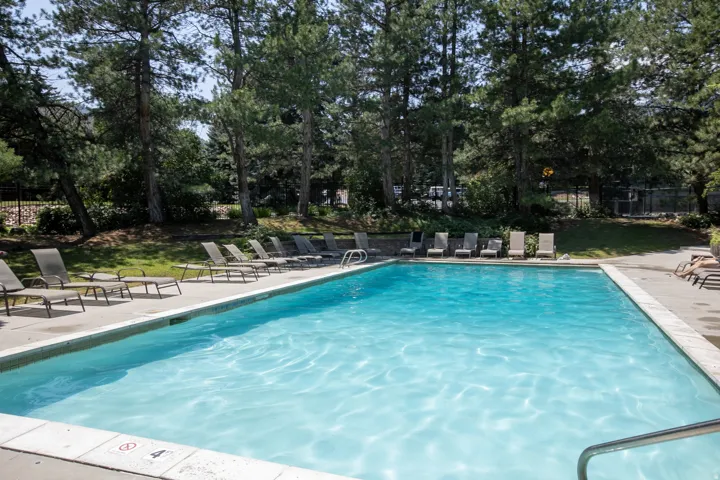 Rectangular swimming pool with a surrounding concrete deck