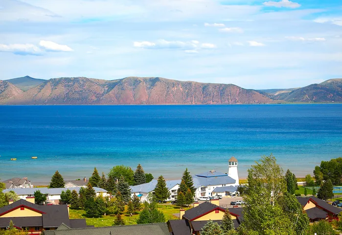 Expansive body of water with distant mountainous terrain