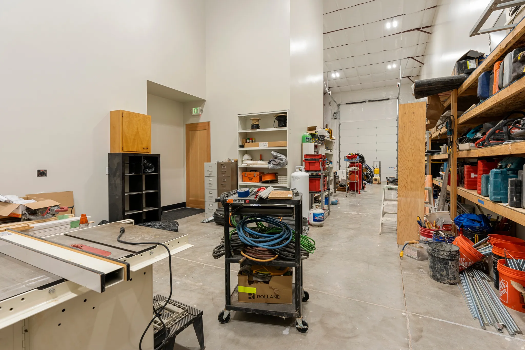 Industrial interior with high ceilings and concrete flooring