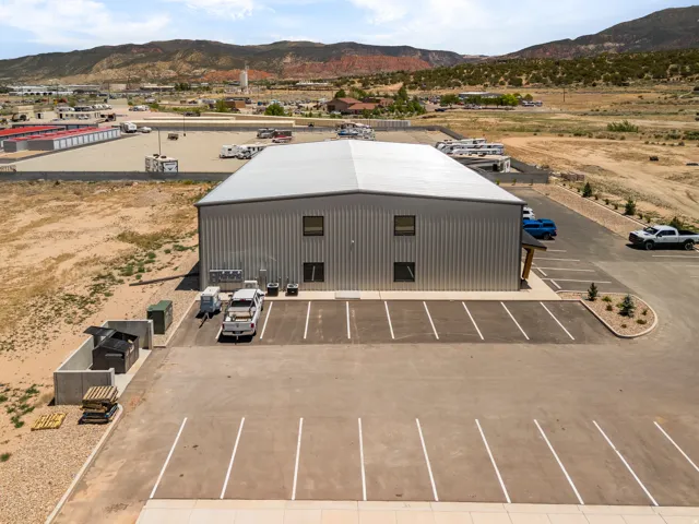 Commercial building with metal siding and a flat metal roof