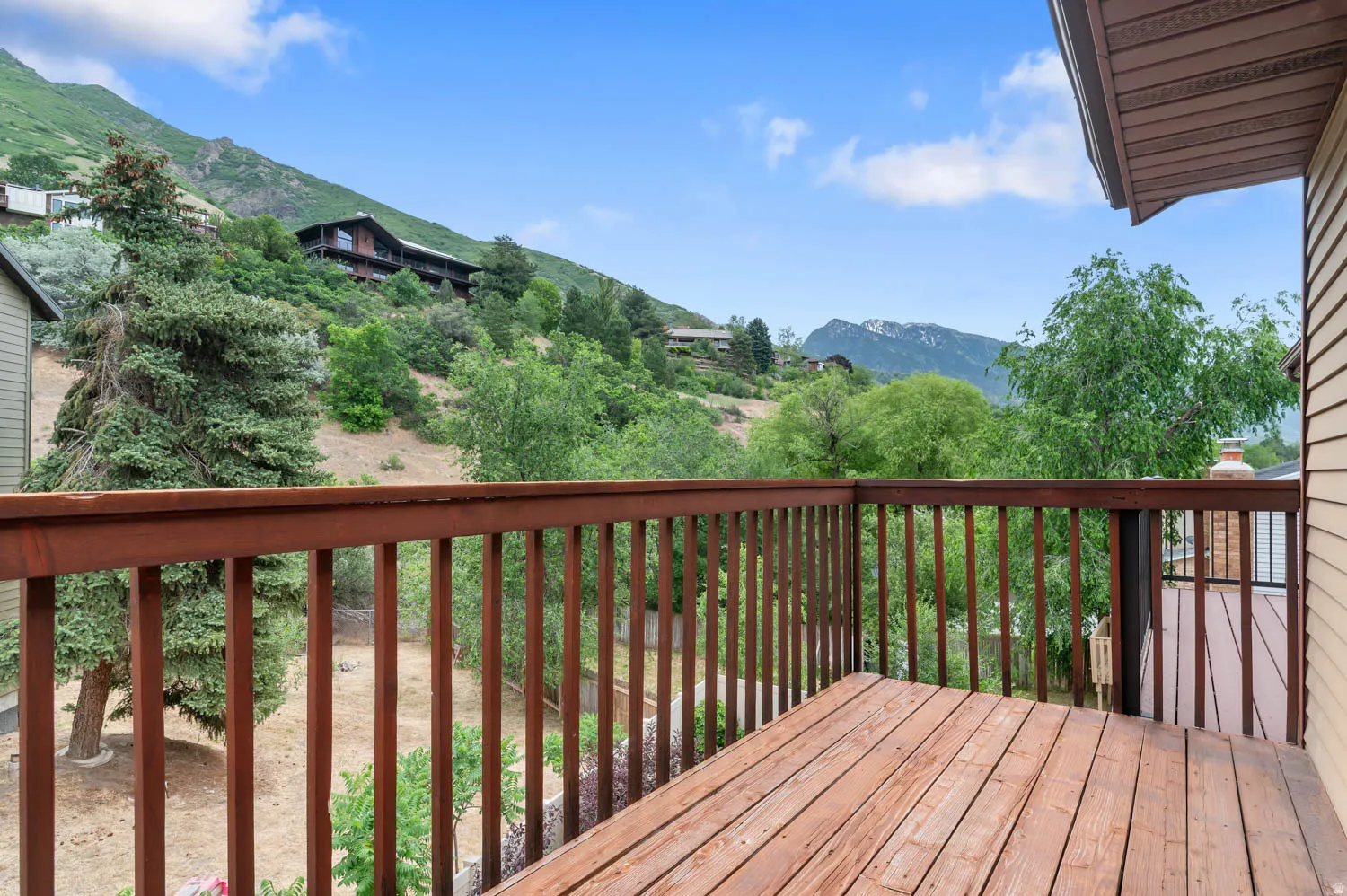 Primary bedroom balcony with mountain views