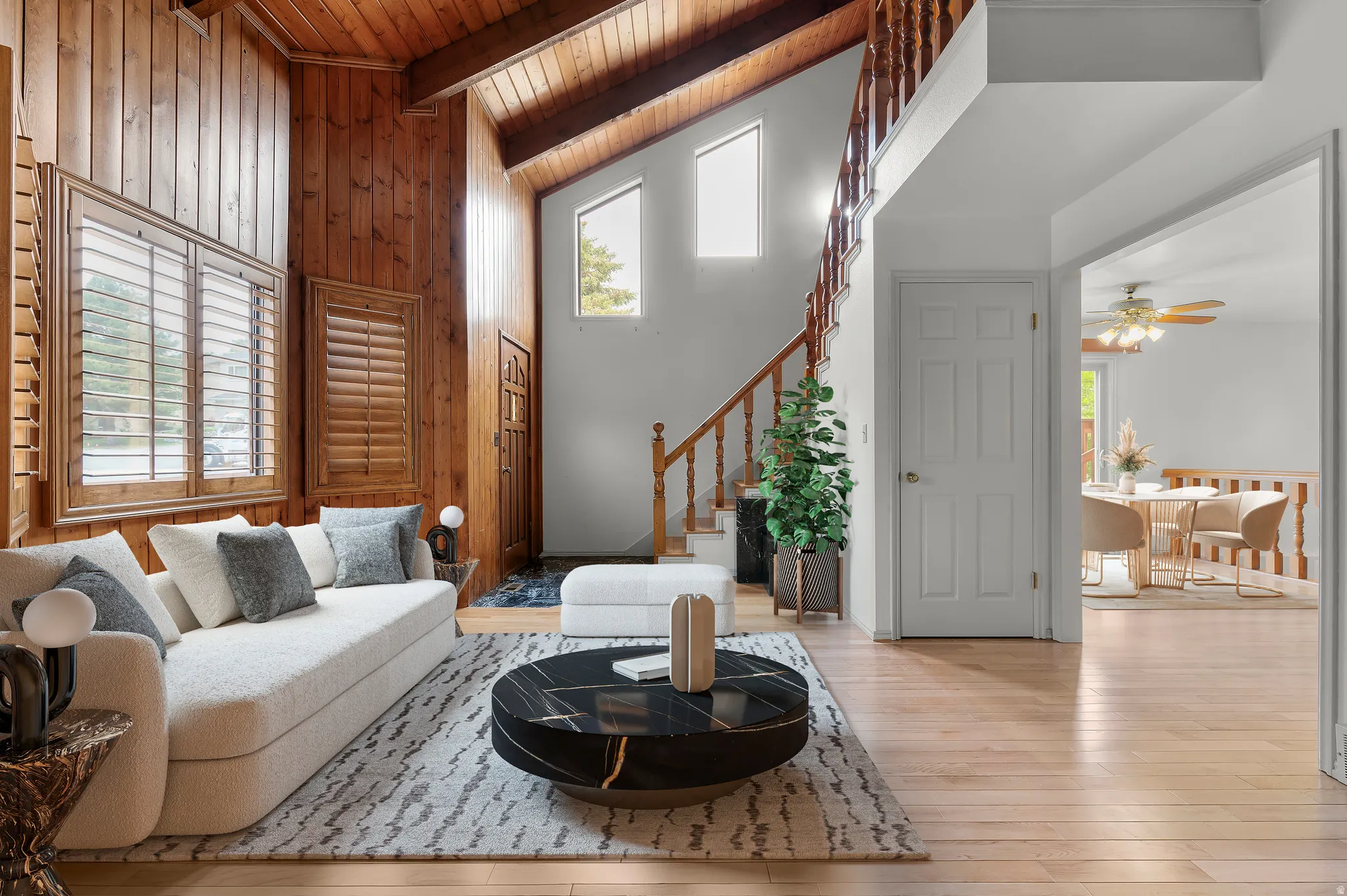 Entryway and living room with vaulted ceilings- virtually staged