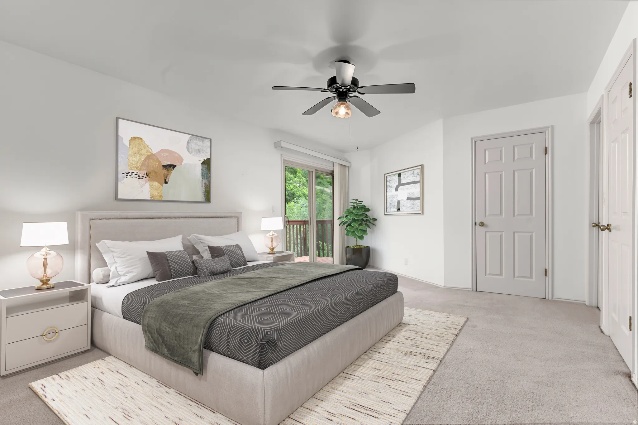 Primary bedroom with balcony- virtually staged