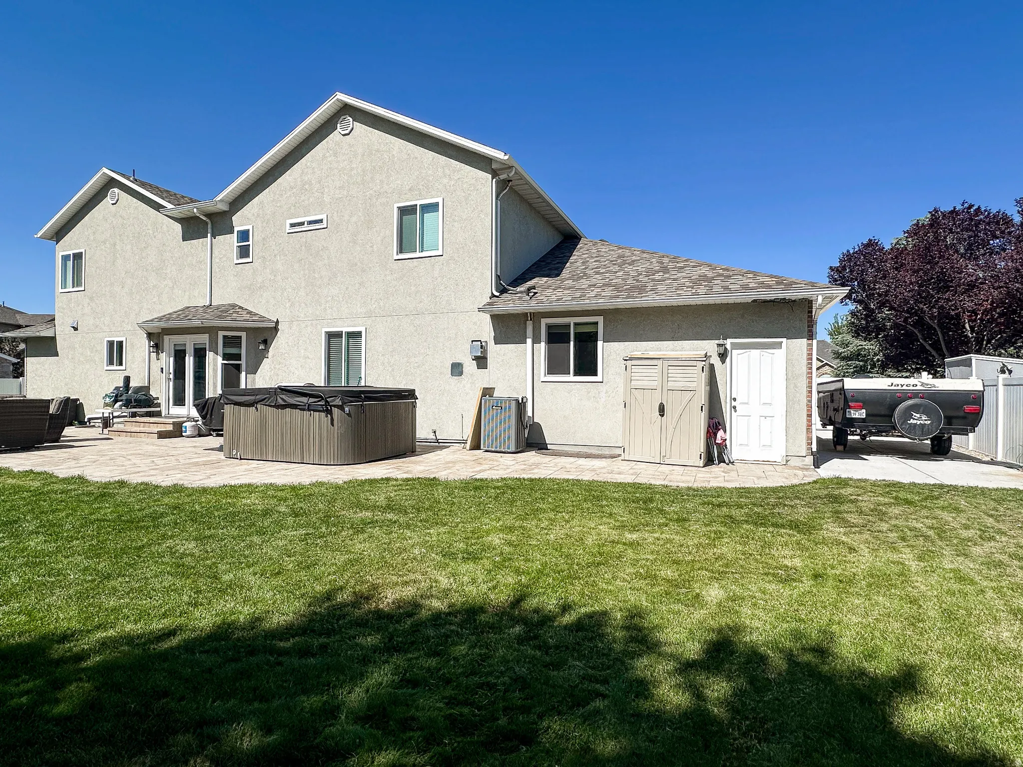 Expansive green lawn providing outdoor space