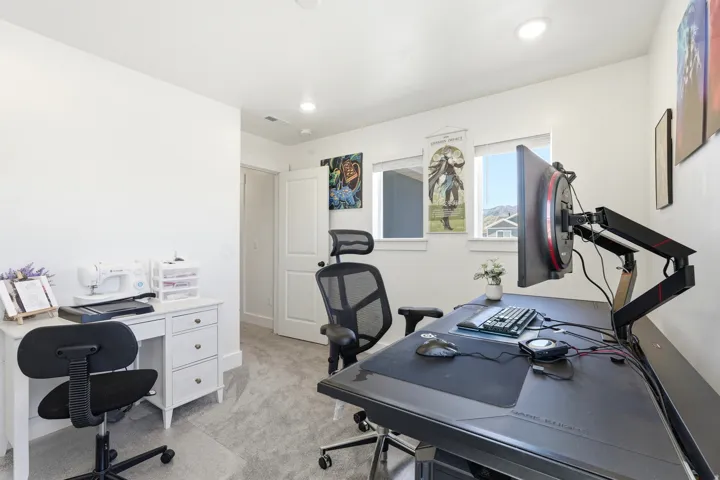 Bright room with light gray carpet flooring