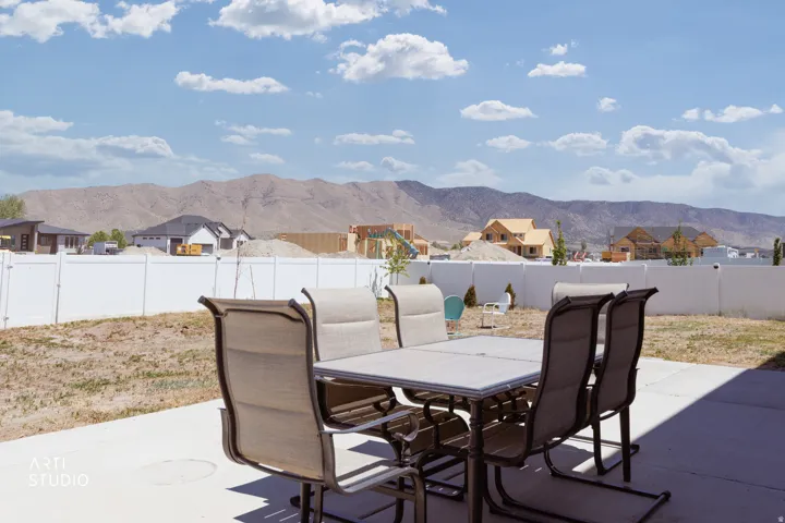 Expansive concrete patio with mountain scenery