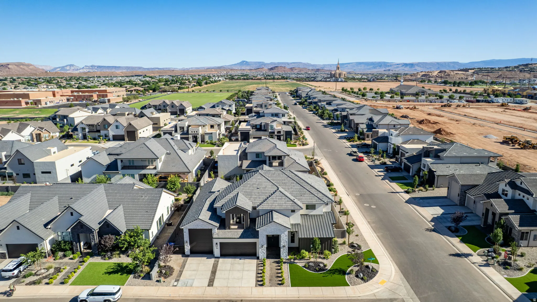 Modern residential community featuring varied architectural styles and mature landscaping