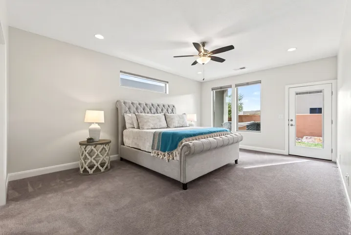 Recessed lighting, ceiling fan, and carpet flooring