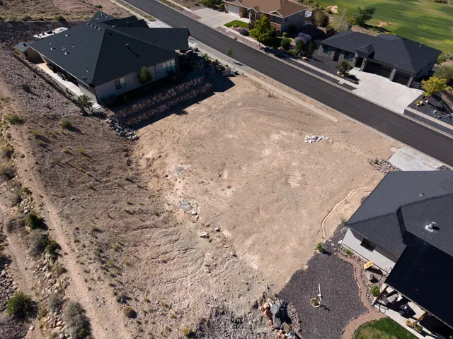 Cleared lot with established street frontage and bordering developed properties