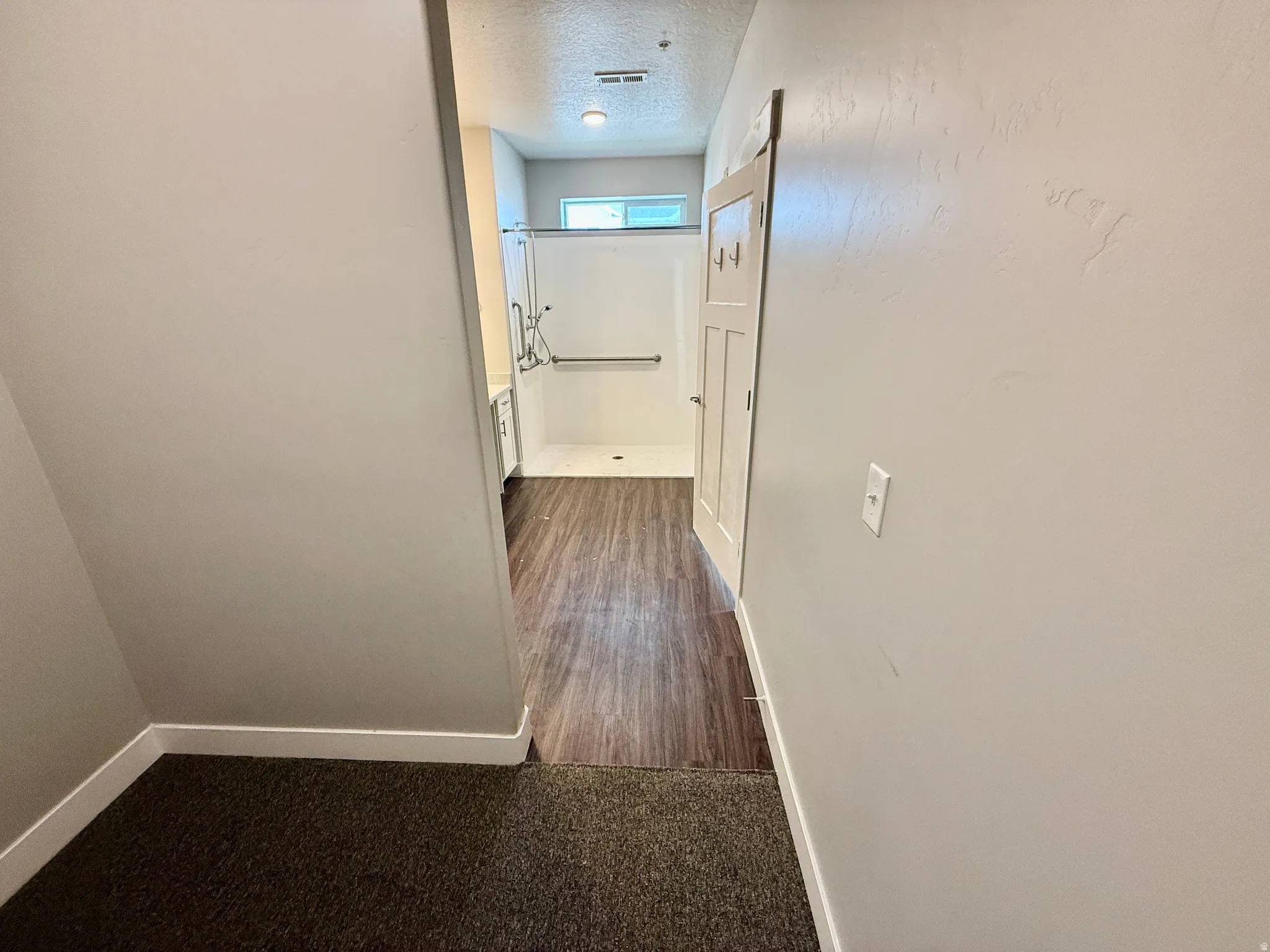 From Walk in closet looking in to master bathroom