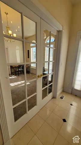French doors with glass paneling and brass hardware