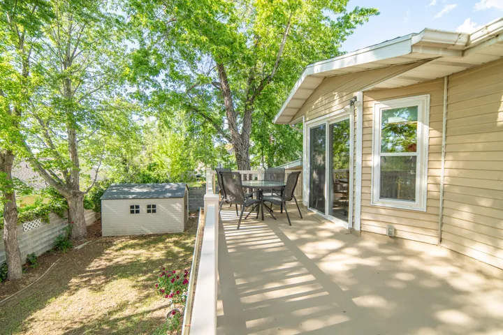 Expansive outdoor deck with sliding glass door access