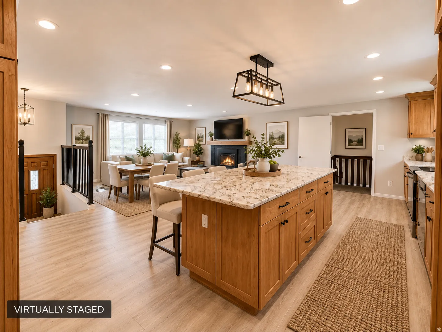 Kitchen island with stone countertop, recessed lighting, and wood-finish flooring