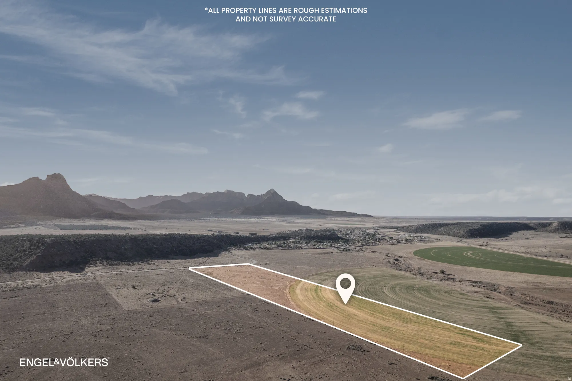 Expansive land parcel featuring defined property lines and surrounding agricultural fields