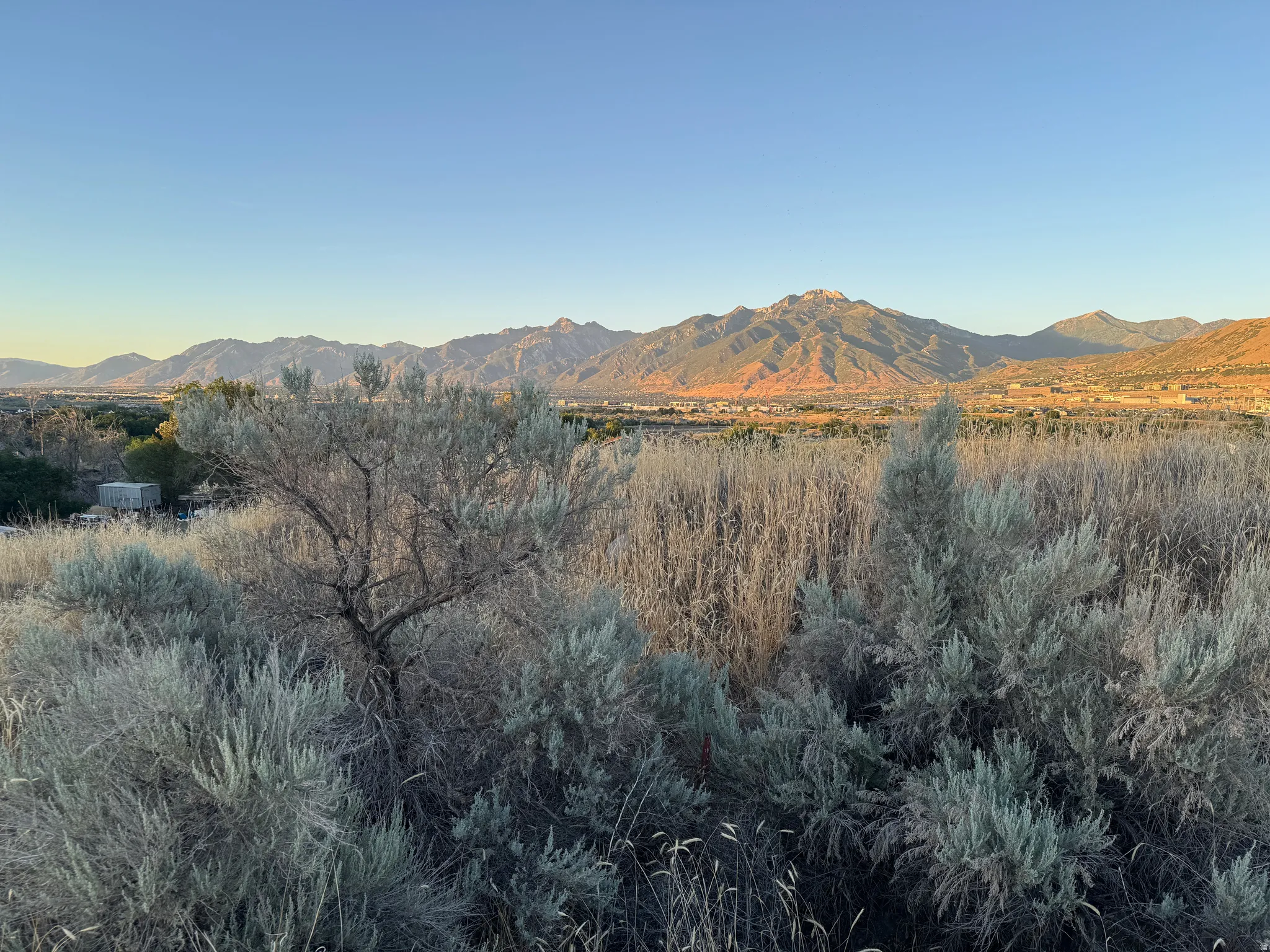 Elevated property featuring natural desert landscaping and expansive mountain scenery