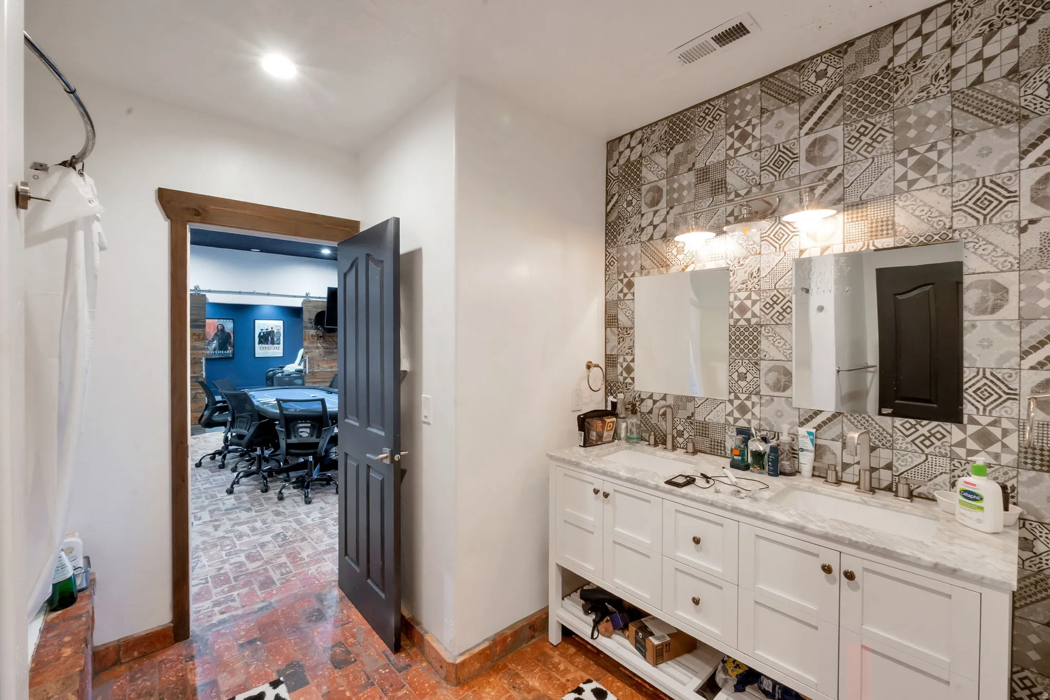 Dual vanity with a white countertop and undermount sinks