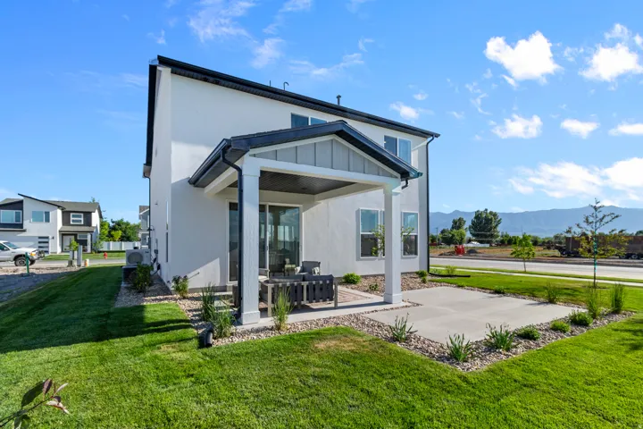 Contemporary white stucco exterior with black trim