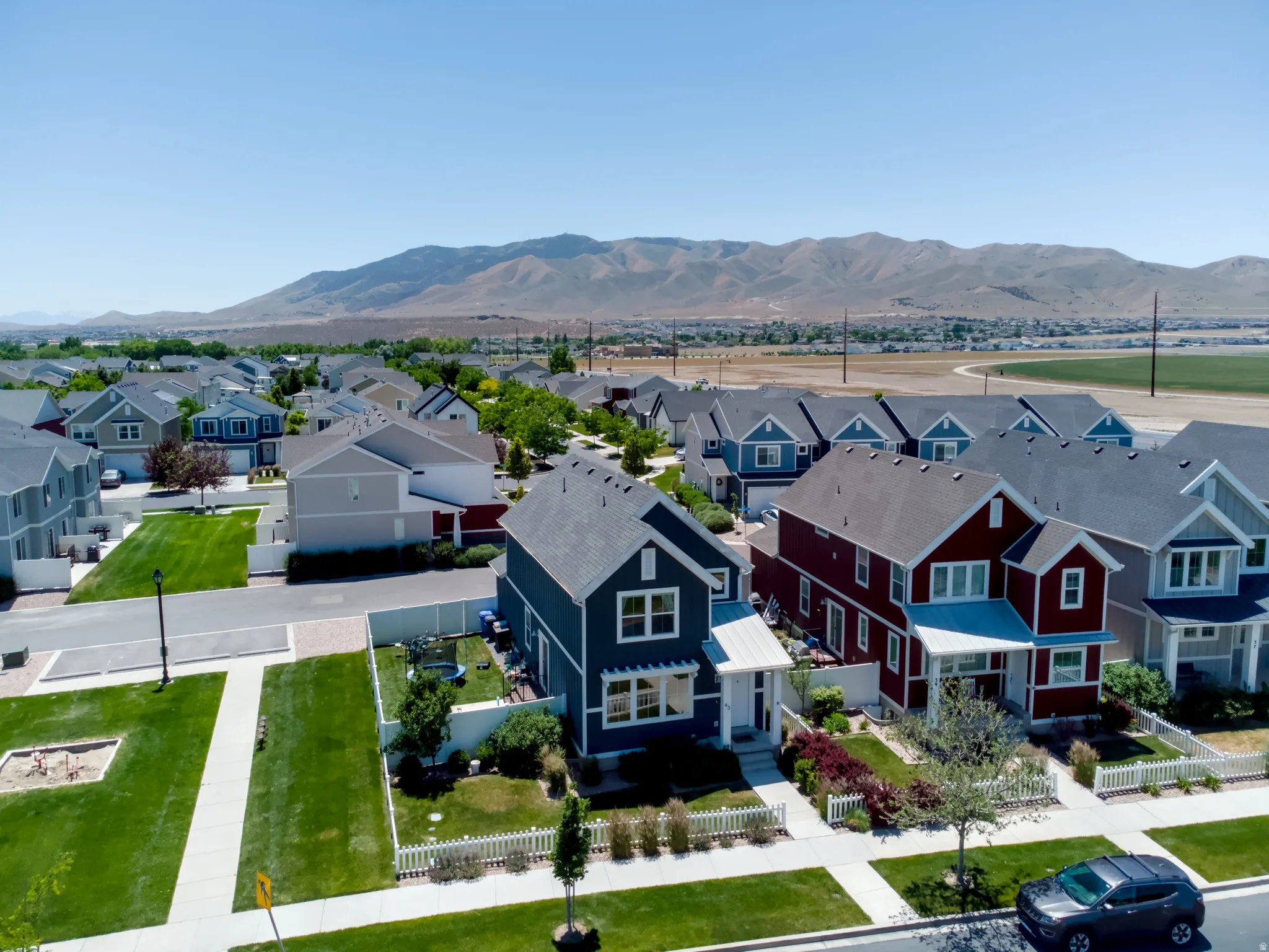 Aerial perspective showcasing a residential development with varied architectural styles