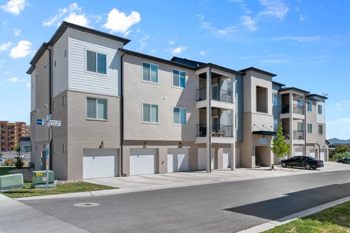 Contemporary multi-story building featuring stucco and horizontal siding finishes