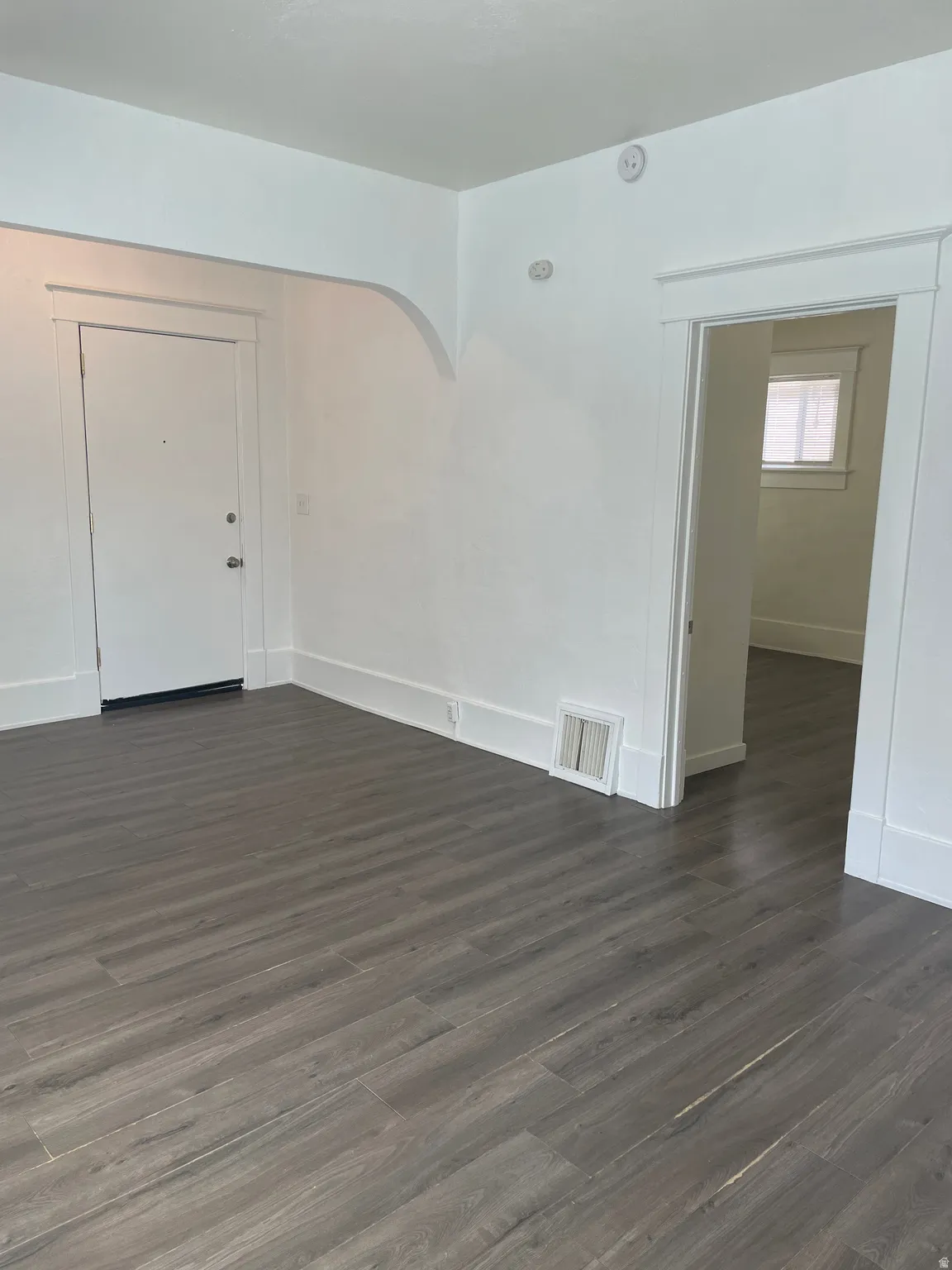 Light gray wood-finish flooring throughout