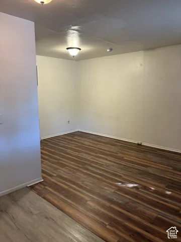 Wood-finish flooring throughout, featuring a distinct plank pattern
