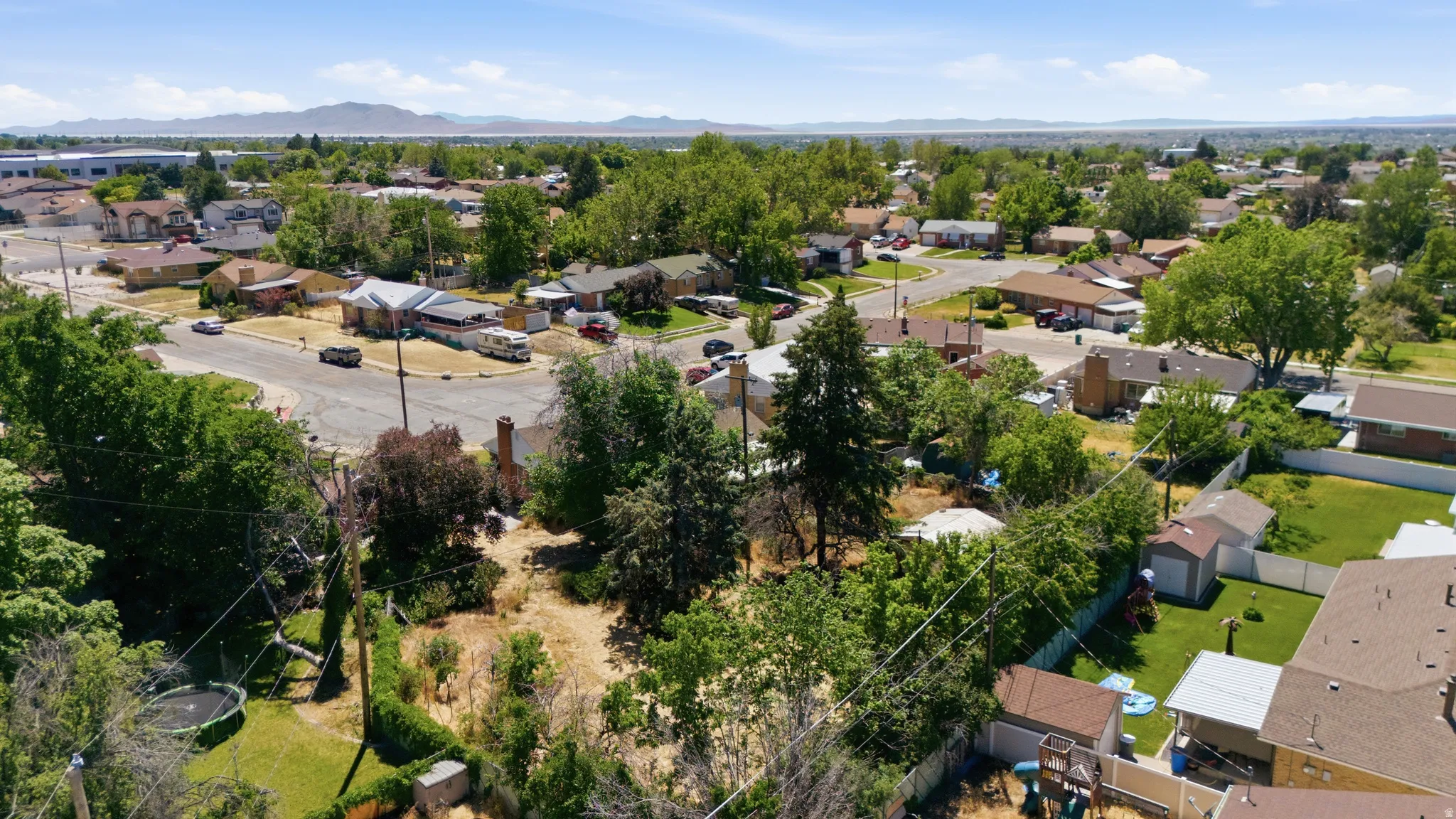 Expansive aerial perspective showcasing a residential area with varied housing styles
