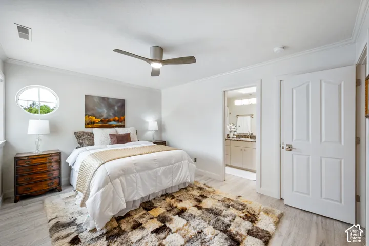 Recessed lighting, crown molding, a ceiling fan, and wood-finish flooring