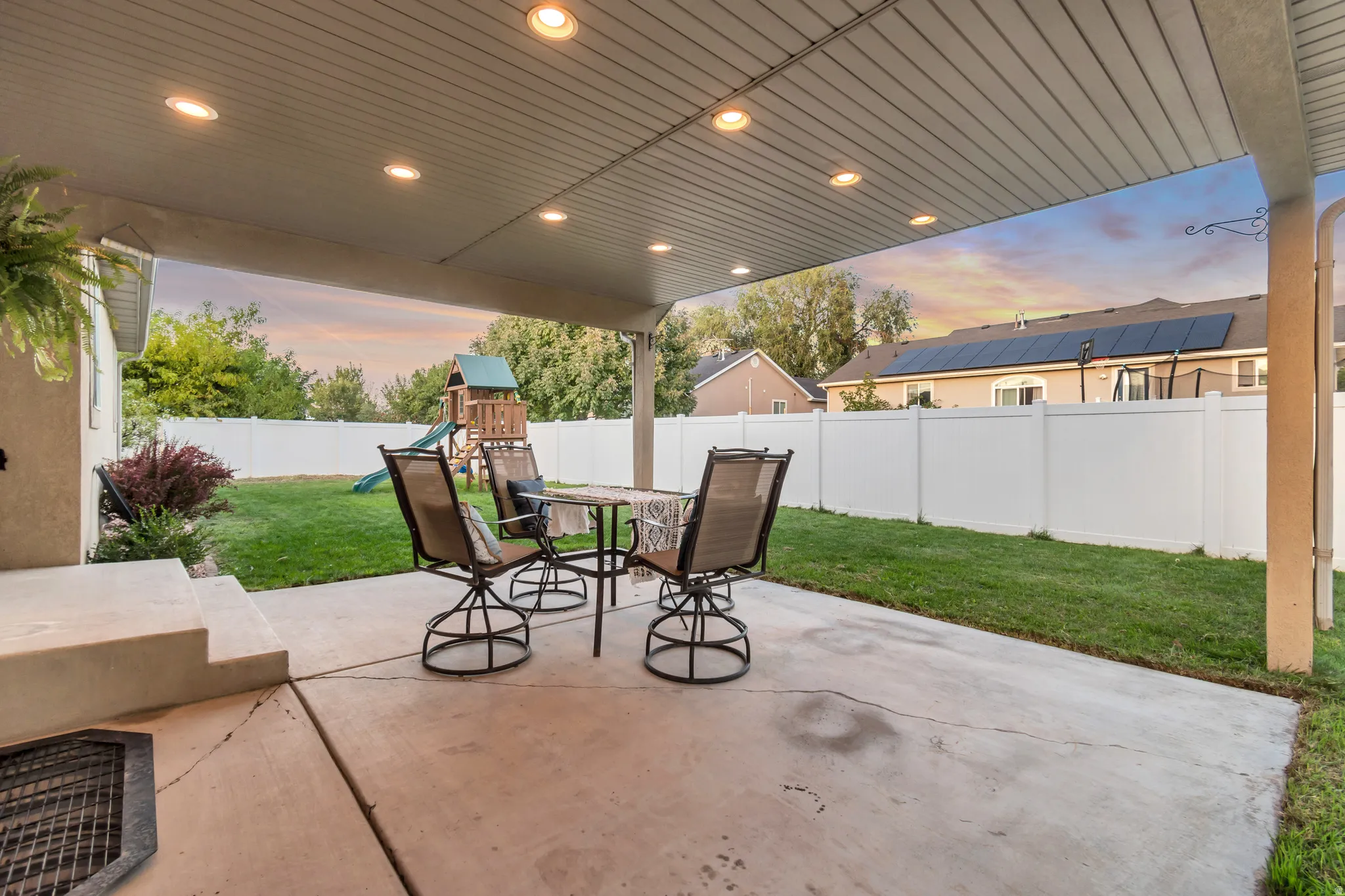 Covered patio featuring recessed lighting