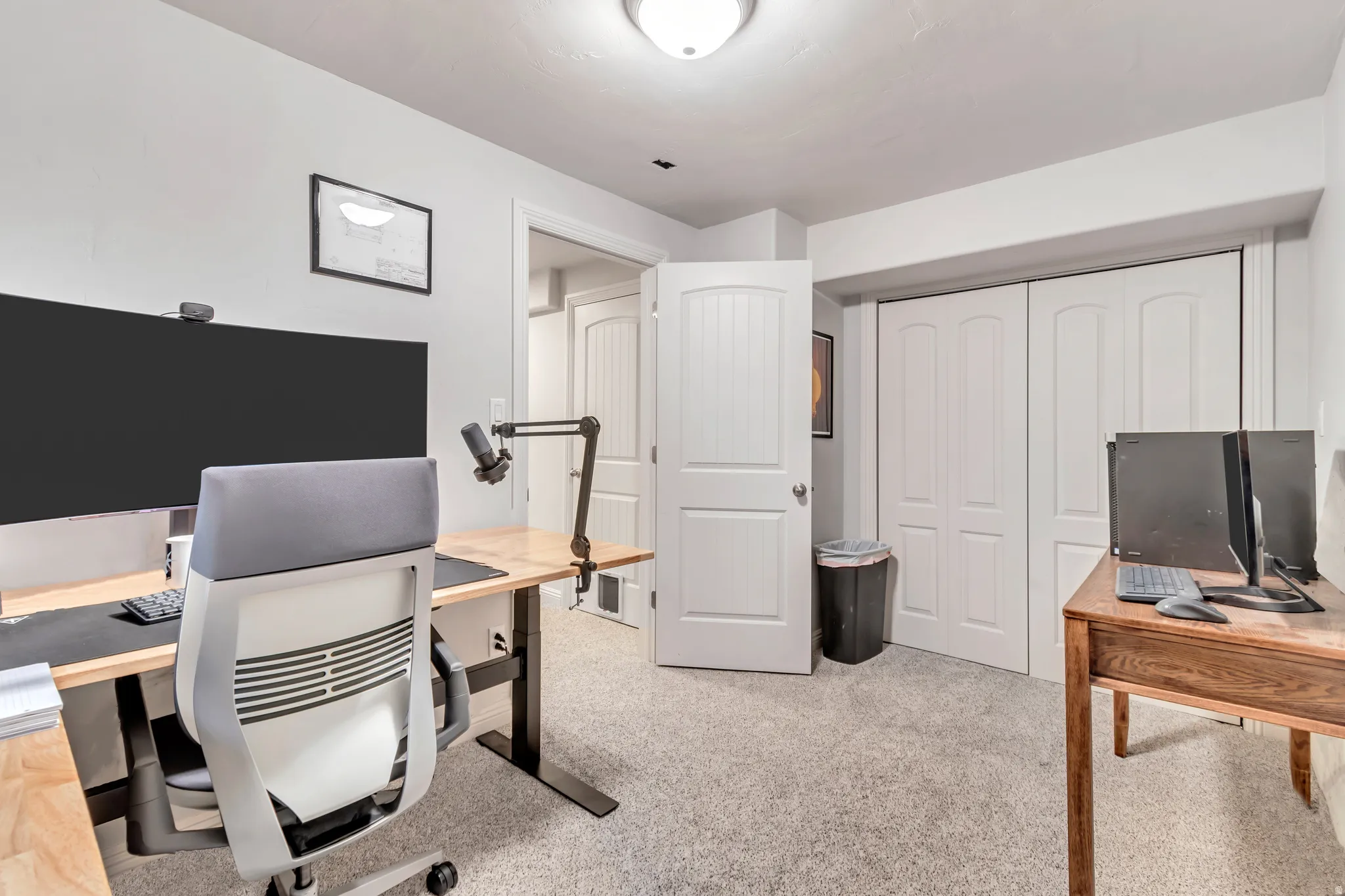 Light-toned carpeting throughout