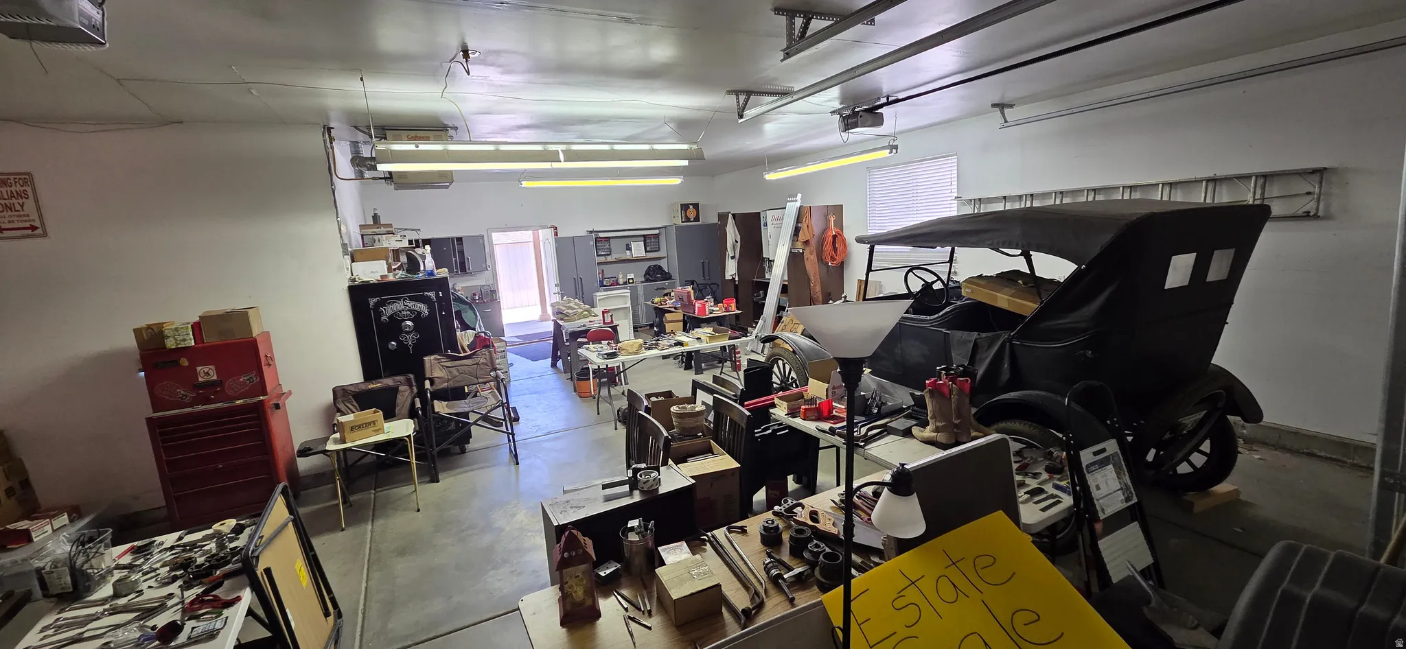 Spacious garage with an open layout and 9' doors