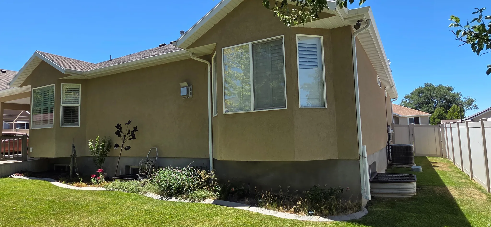 Bay windows, dual pane windows, and a mature lawn