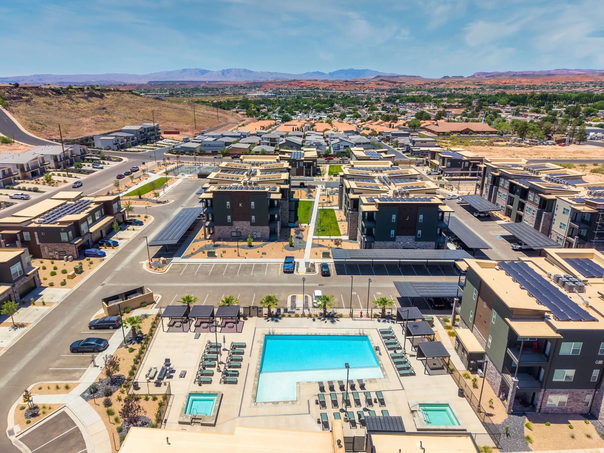Community amenities featuring a central swimming pool with integrated spa
