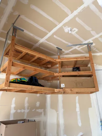 Overhead wood-frame shelving system for optimized storage