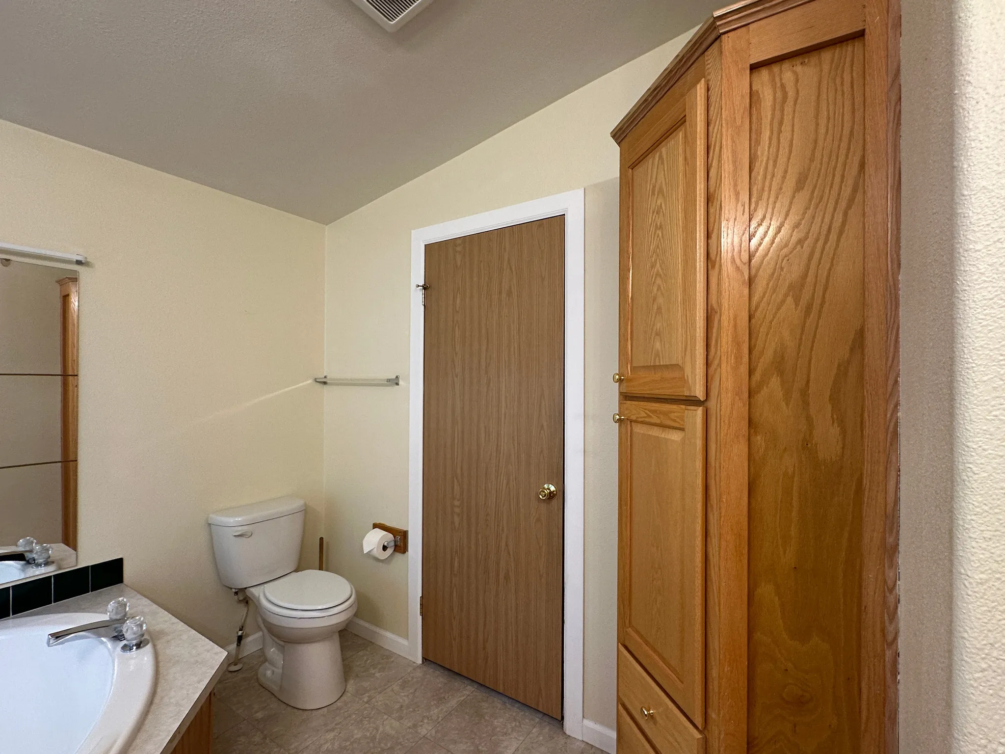 Corner built-in cabinetry provides ample storage