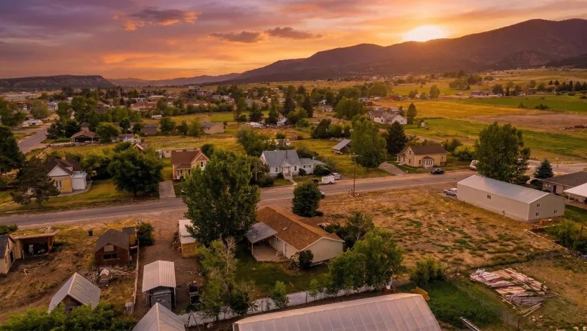 Panoramic neighborhood setting with distant mountain range
