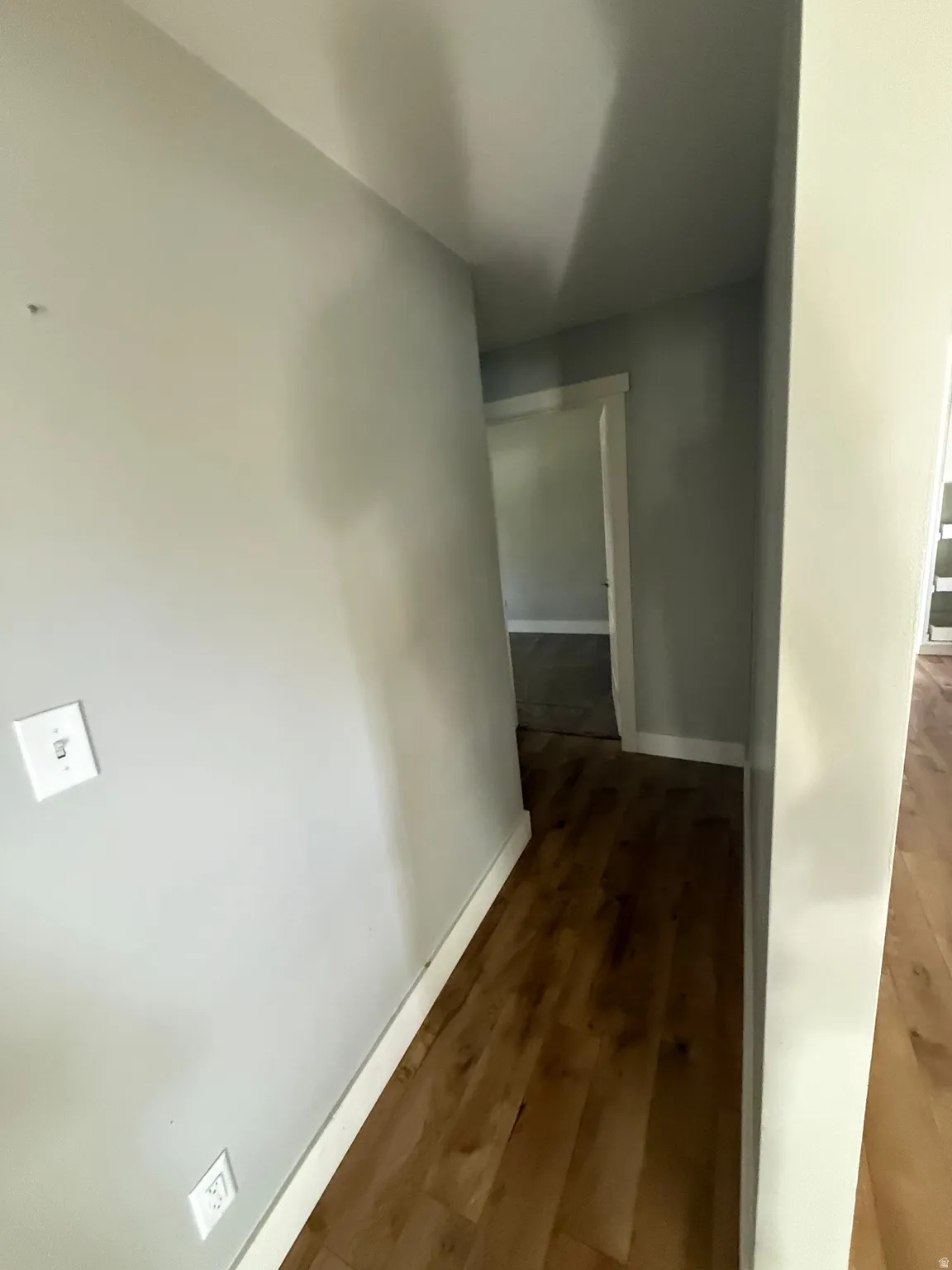 Wood-finish flooring with white trim