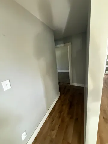 Wood-finish flooring with white trim