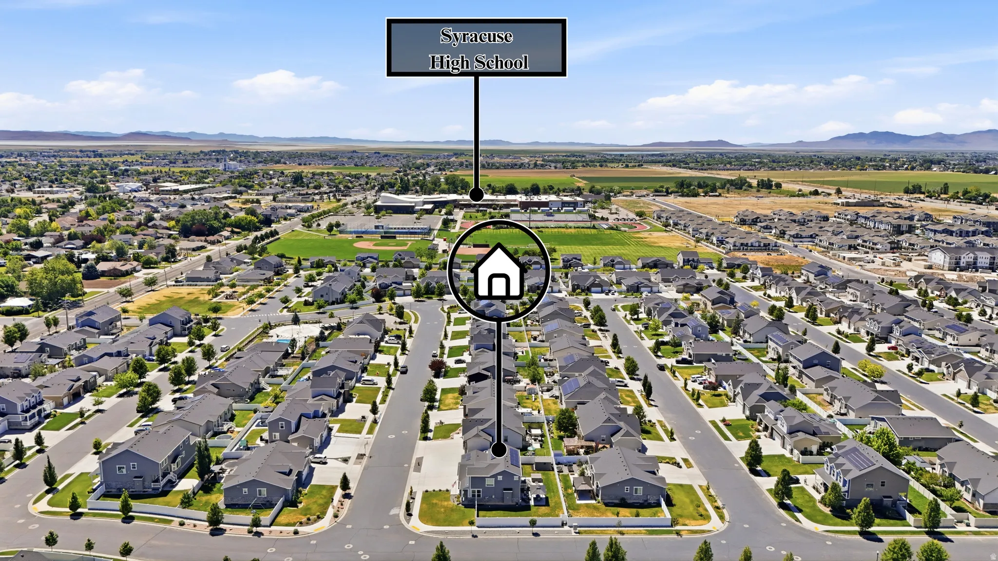 Aerial perspective showcasing a residential neighborhood with uniformly designed homes and manicured lawns