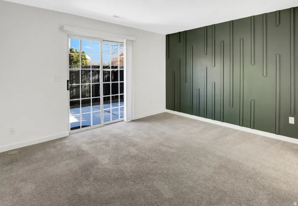 Sliding glass patio door opening to outdoor space