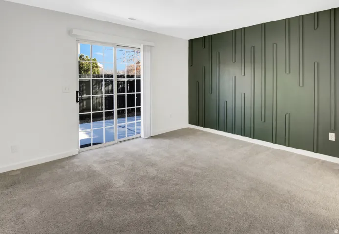 Sliding glass patio door opening to outdoor space