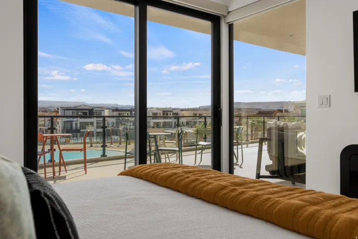 Sliding glass doors opening to a private balcony