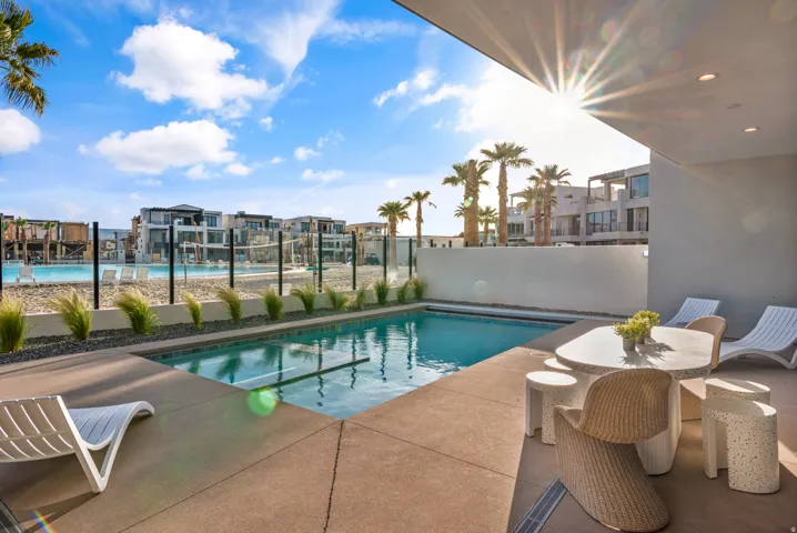 Private swimming pool with concrete decking