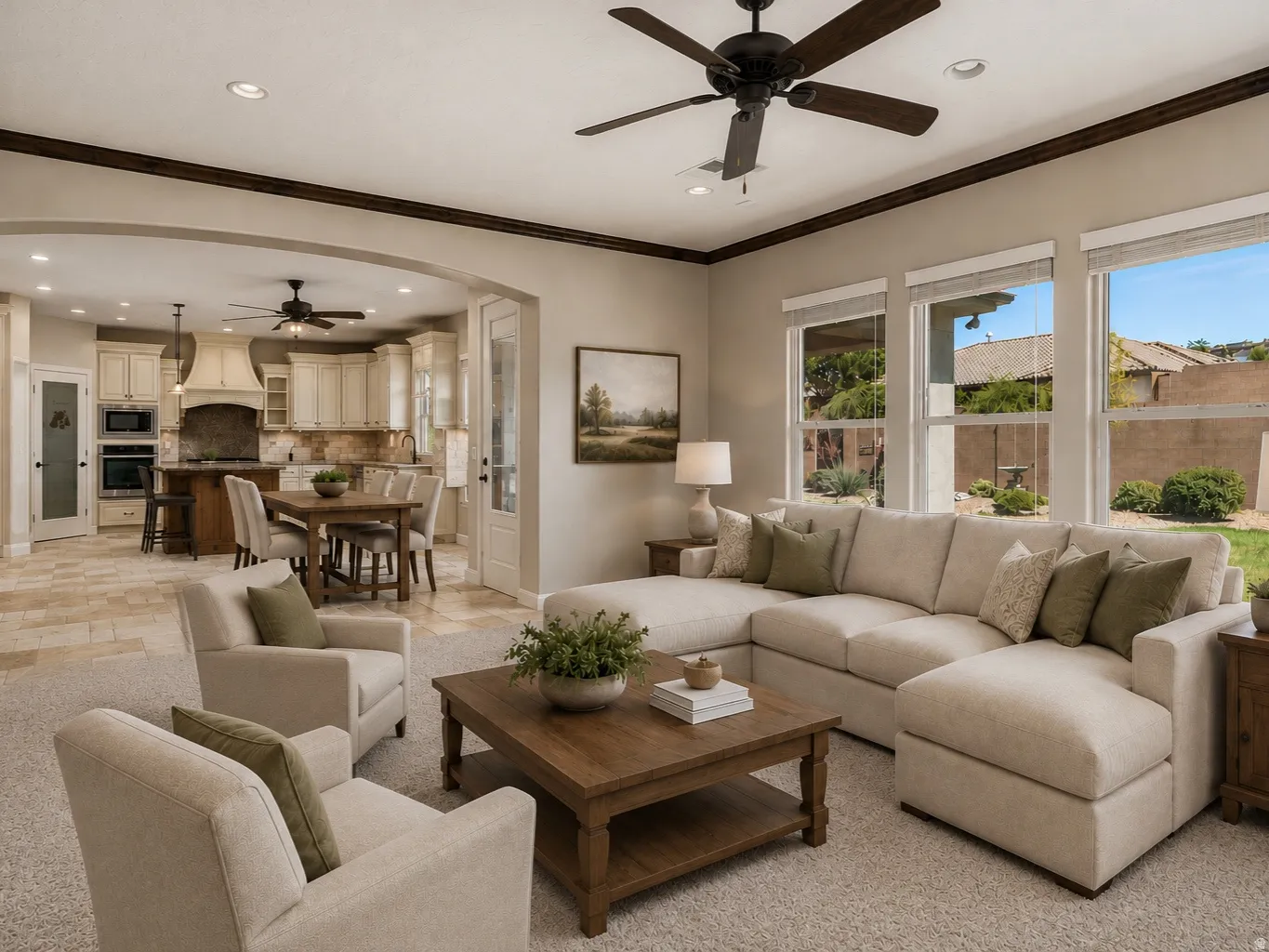 Spacious living area featuring carpet flooring, triple windows with outdoor views, and decorative ceiling fans