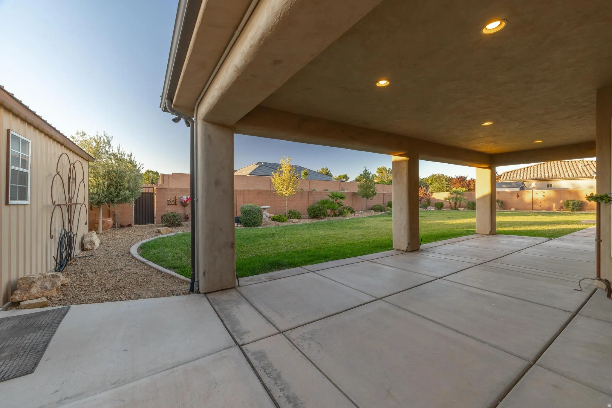 Expansive covered patio featuring recessed lighting and concrete flooring