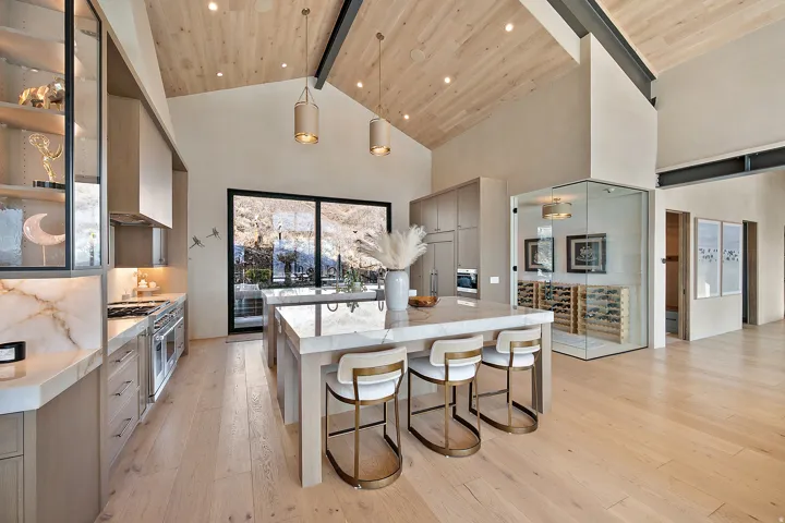 Vaulted wood-paneled ceiling with exposed beams