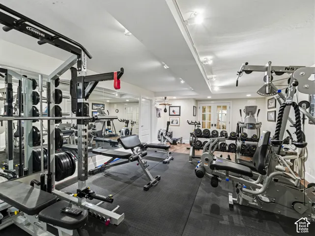 Dedicated fitness space featuring rubberized flooring