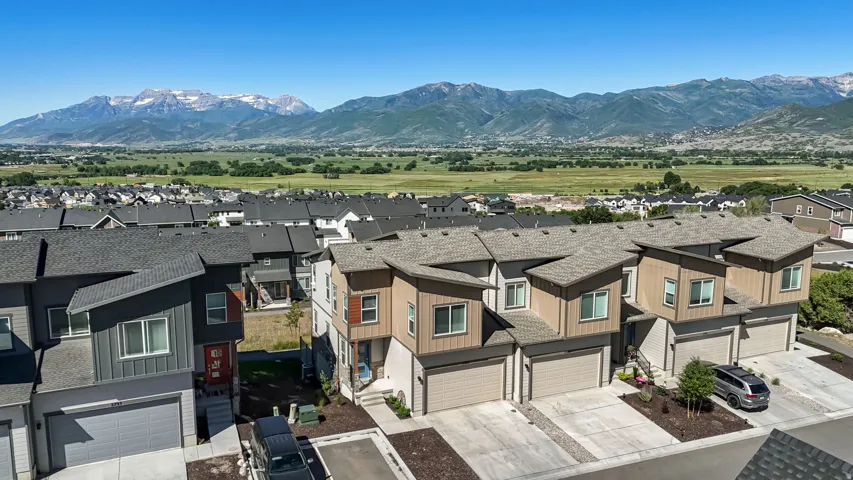 Modern townhome community featuring contemporary architectural design and mountain scenery